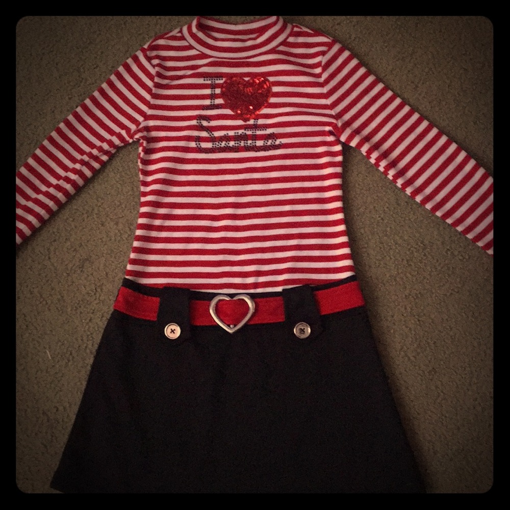 Red,white,and black dress,red belt,heart buckle.